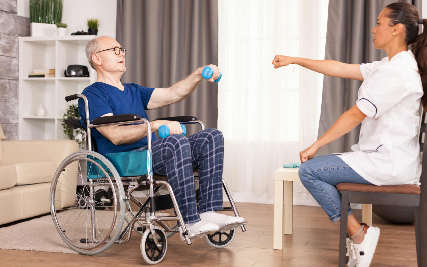 Maid taking care of elderly